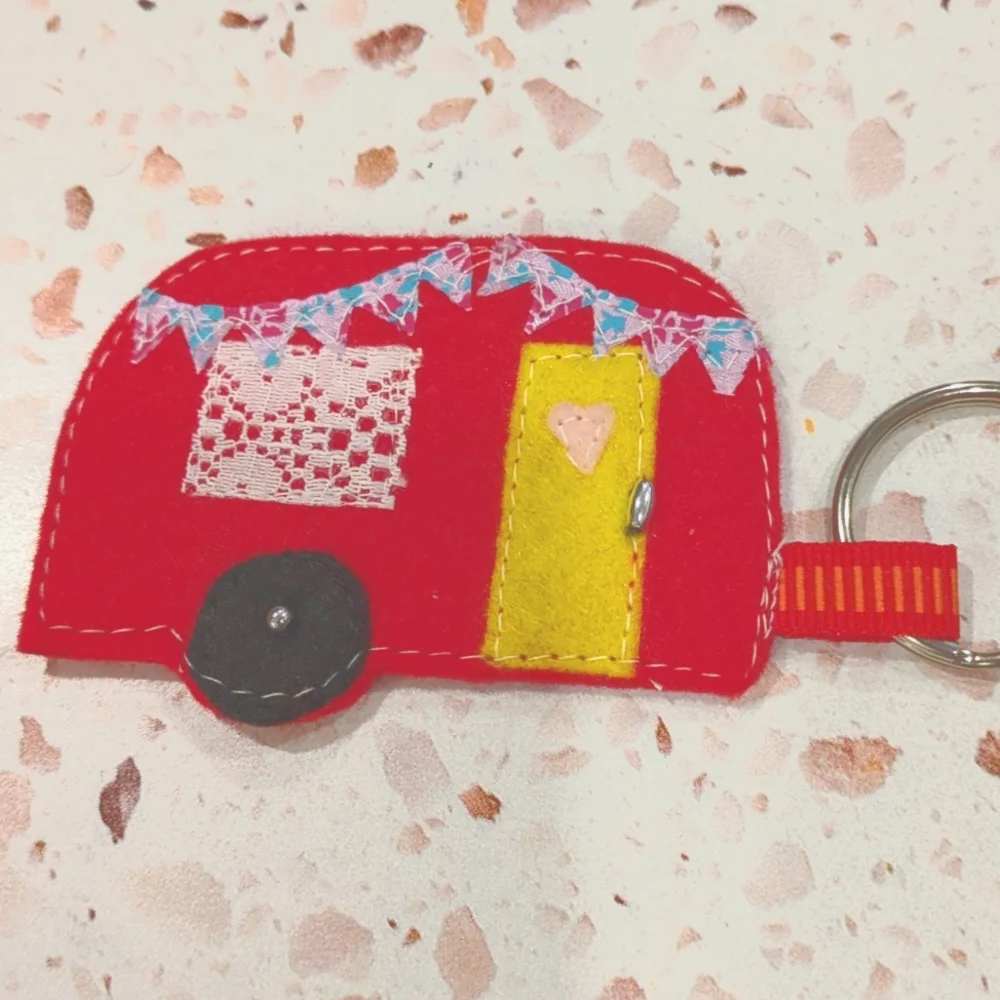 handcrafted red camper